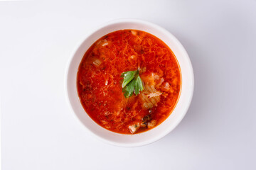 red soup with meat on a white background