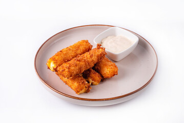 cheese sticks with sauce on a white background