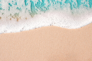 Fototapeta na wymiar wave on the sandy beach, background