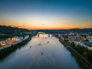 An Aerial Riverboat Sunset on a Summer Evening