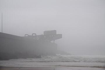 Obraz premium Sea beach in a summer foggy morning