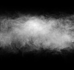 Abstract smoke texture over black. Fog in the darkness.