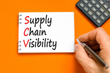 SCV supply chain visibility symbol. Concept words SCV supply chain visibility on white note on a beautiful orange table orange background. Business SCV supply chain visibility concept. Copy space.