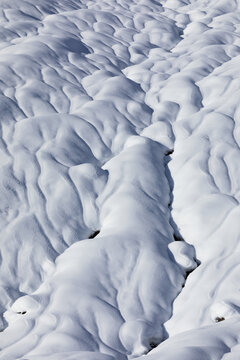 Snow runnels in Hatcher's Pass, Alaska on sunny day in winter; Alaska, Untied States of America