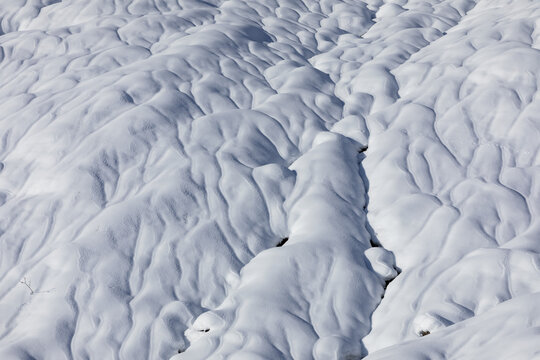 Snow runnels in Hatcher's Pass, Alaska on sunny day in winter; Alaska, Untied States of America