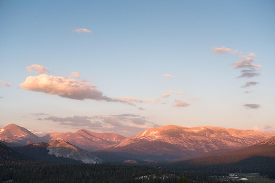 A view to Tuolumne Meadows and nearby mountains from Pothole Dome at sunset.; Yosemite National Park, California, United States of America
