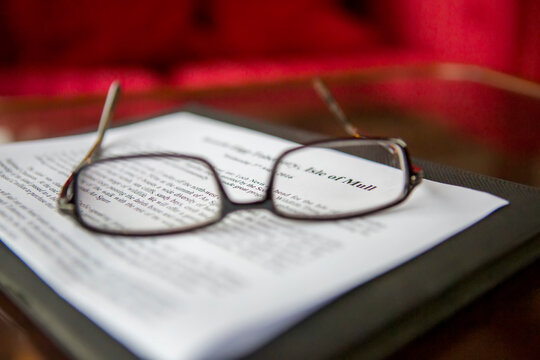 Eyeglasses frame a travel itinerary about the Isle of Mull, Scotland; Isle of Mull, Scotland