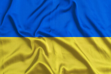 Ukrainian flag closeup. silk texture. waving country flag.