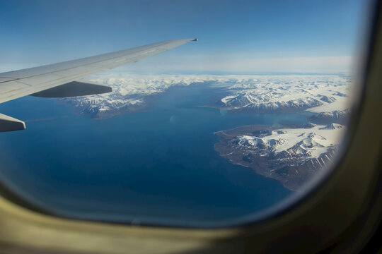 View of Svalbard, Norway from an airplane window.