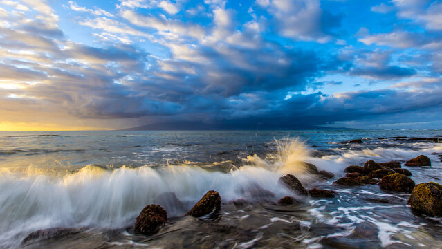 Waves hit rocks on a Pacific Beach on Maui.