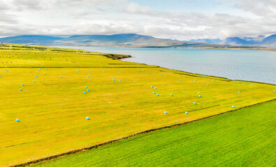 Aerial view of beautiful Grundar Fjord in summer season, Iceland.