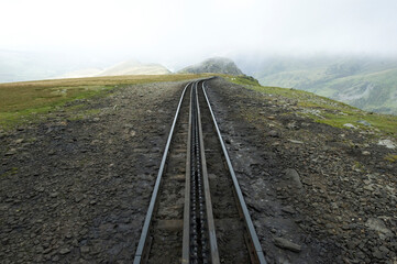 Train tracks on Mount Snowdon in Wales, United Kingdom; Mount Snowdon, Wales, United Kingdom