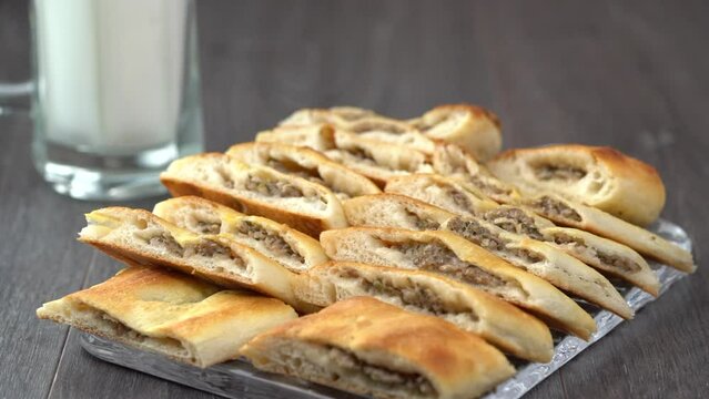 Turkish traditional pastry, Su b&ouml;reği, Karak&ouml;y B&ouml;reği, Karakoy b&ouml;regi, su boregi, Turkish Su Boregi pie, Tabla borek or burek in plate. Bosnak boregi, gocmen boregi, kapali pide, pide, kıymalı borek, 