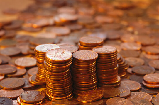 Close view of American pennies in piles; Nebraska, United States of America