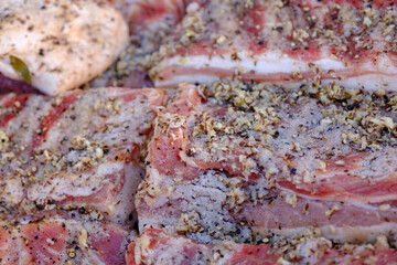 Large pieces of salted bacon. According to traditional Ukrainian recipes. Handmade trade in the rural market