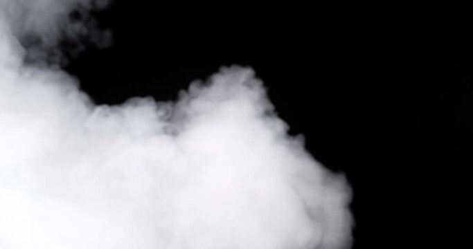 Fog  Smoke with black background in Studio lighting. Neutral color white fog, smoke. 4K DCI file good for textures or vfx use