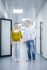 A couple in the clinic corridor before procedure