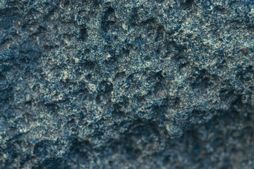 Granite stone close-up. Macro photo texture of granite stone surface