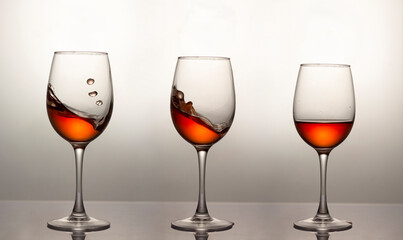 falling glass with red wine, motion blur, blur