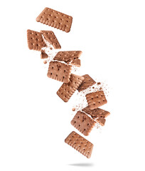Delicious biscuits with chocolate flavor crushed in the air isolated on a white background