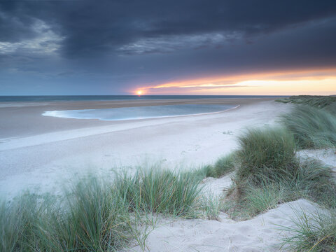 Sunrise over the Burnham Overy dunes on a summer morning.