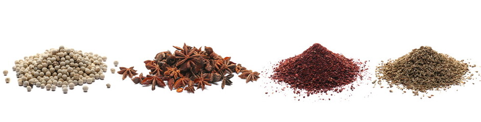 Set spice pile, white peppercorns, star anise, ground sumac, anise seeds isolated on white, side view - obrazy, fototapety, plakaty