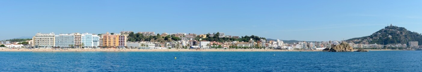 Fototapeta na wymiar Coastline with Blanes beach towards Sa Palomera Rock, Catalonia.