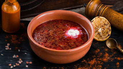 Red borscht soup with beets, potatoes, cabbage, onions, spices and sour cream.