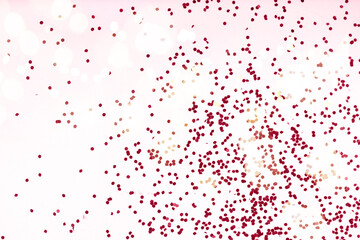 Christmas flat lay scene with scattered stars, top view over pink