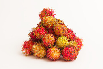 Group of red rambutan sweet delicious fruit isolated on white background, front view