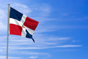 Dominican Republic flags over blue sky background. 3D illustration