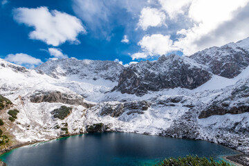 Obraz premium snowed Lake Drachensee during spring (Tyrol, Austria)
