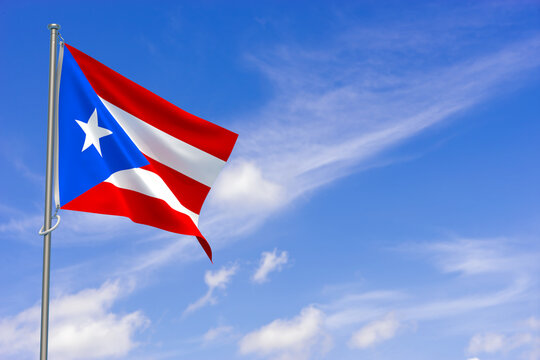 Puerto Rico flags over blue sky background. 3D illustration