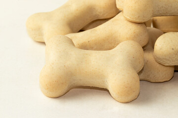 Focus on the first dry dog biscuit .
