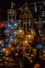 Fototapeta na wymiar lanterns at dark shop at turkish bazar