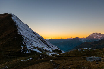 Fototapeta na wymiar sunrise over the snowy mountains during spring (Carschinahütte, Grisons, Switzerland)