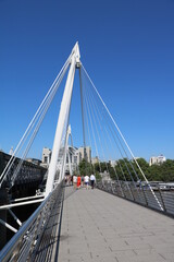 Fototapeta na wymiar Footbridge Hungerford Bridge in London, England Great Britain
