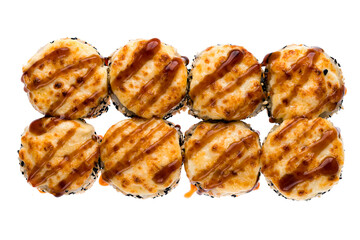 Maki sushi rolls with salmon, cream cheese, cucumber topped baked cheese, sesame and teriyaki sauce isolated on white.