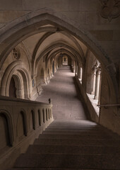 Aisle of a historic monastery.