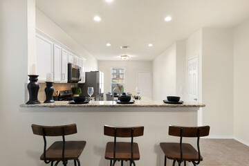 Kitchen with a bar