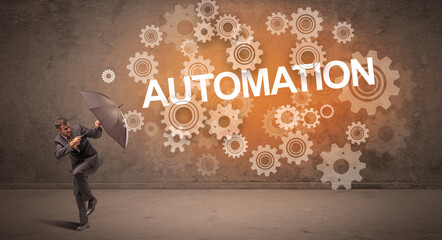 Obraz premium Businessman defending with umbrella concept