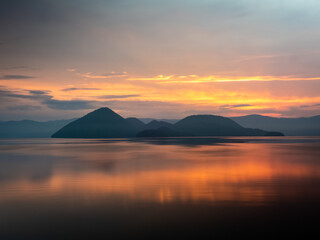 Fototapeta na wymiar Mysterious dawn of Lake Toya