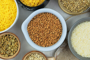 Buckwheat in bowl. Various vegetarian organic products. Vintage view. Top view. Copy space.
