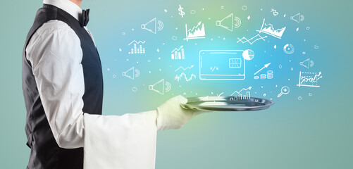 Handsome young waiter in tuxedo holding money icons on tray
