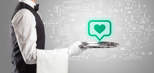 Close-up of waiter serving social media icons