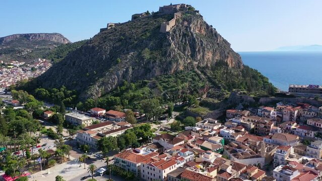 Aerial drone video from picturesque uphill fortress of Palamidi in city of Nafplio former capital of Greece, Argolida, Peloponnese 