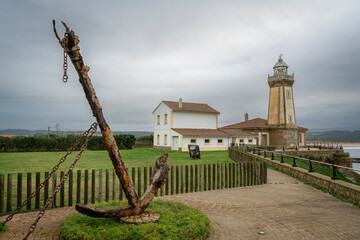 Aviles (or San Juan de Nieva) lighthouse in Asturias, Spain, during a cloudy day