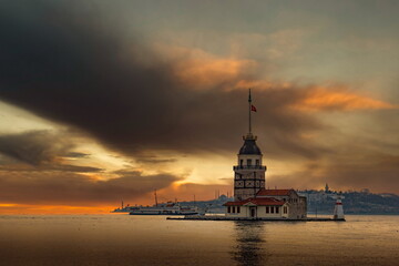 Maiden Tower (Kiz Kulesi) in Istanbul in the evening with sunset sky. Bosporus strait.