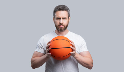 photo of athlete basketball player with ball. athlete basketball player in sportswear.