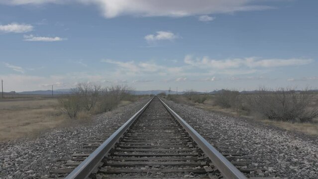 railroad tracks in the rural countryside of West Texas near Marfa.